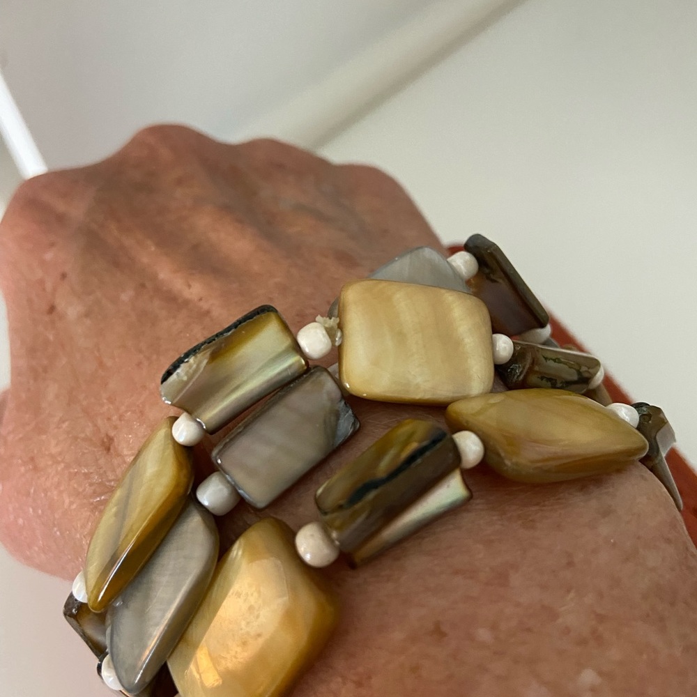 Very attractive stretch bracelet. Hand made by local Artisan maker name unknown.